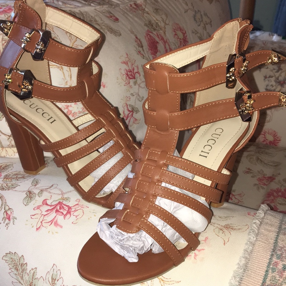 Two pair of size 11 heels in new condition .